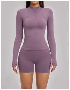 Detail of lavender yoga jacket featuring full zipper and thumbhole cuffs on sleeves