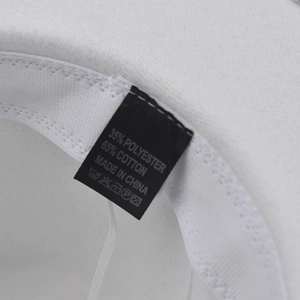 Close-up of white wool fedora inner lining with material label and sweatband