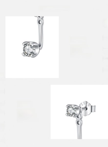 Macro shot of 925 sterling silver earrings with 5A cubic zirconia and geometric details