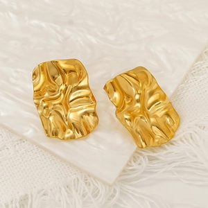 Golden irregular geometric stud earrings with elegant pleated metal texture for women