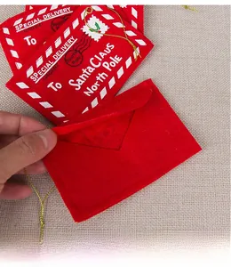 Detail view of red felt Christmas envelope bag for candy and holiday cards