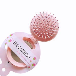 Pink portable folding hairbrush with mirror in cute strawberry series packaging