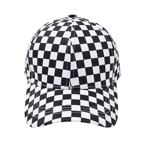 Fashionable checkerboard pattern baseball cap with a classic curved brim on white background