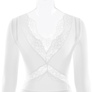 Detail view of the elegant lace patchwork and crisscross pattern on the back of the dress