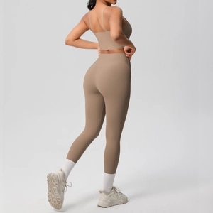 Detail showing the double-sided brushed taupe yoga set with cross back and high waist fit