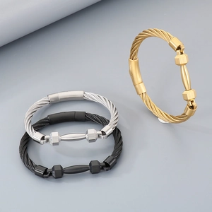 Detailed view of stainless steel barbell rope bracelets in gold silver and black finishes