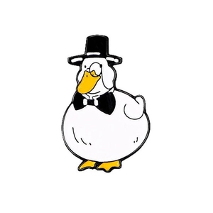 Cute white cartoon duck enamel pin with a black top hat and bowtie for clothing
