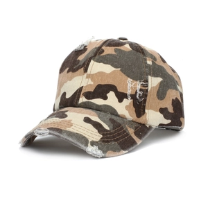 Close-up of distressed jungle camouflage baseball cap featuring torn brim and frayed details