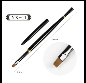 Macro shot of a 15.1cm black professional nail art brush with a 0.8cm flat bristle head