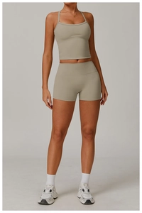 Close-up of seamless high-waist yoga shorts and brushed fitness tank top in khaki
