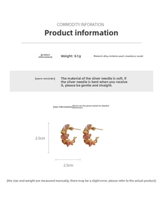 Detailed view of C-shaped earrings with strawberry quartz, pearls and gold plating
