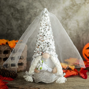 Romantic bride gnome doll with silver sequins, white veil and flowers for wedding decor