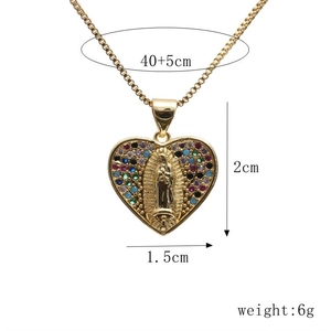Detailed view of gold Virgin Mary heart pendant with colorful zircons and size specs