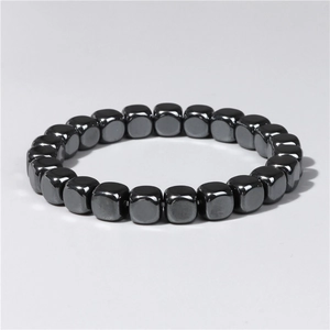 Men's vintage hematite cube bead bracelet with metallic luster on elastic cord