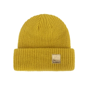 Detail of ginger yellow knitted beanie with ribbed texture and Happy Beanies metal tag
