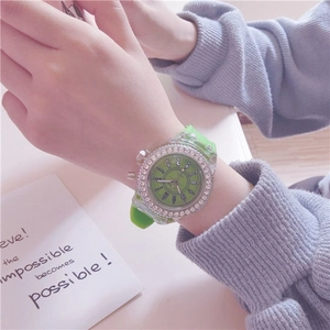 Fashionable green quartz watch for women with rhinestone bezel and silicone strap