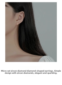 On-ear view of minimalist 925 silver geometric diamond earrings with micro-set zircons