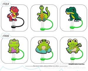 Detail view of cute silicone straw covers featuring cartoon dinosaur and frog designs