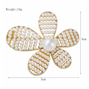 Golden camellia flower brooch with white pearls, weight 14g and size 5cm x 4cm