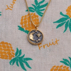 Gold plated crescent moon and star necklace with grey enamel and crystal inlay