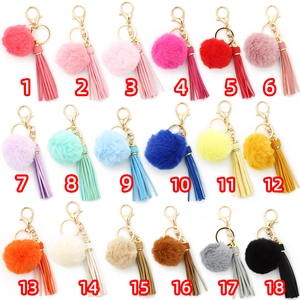 Grid view of 18 colorful faux fur pompom keychains with leather tassels and gold alloy rings