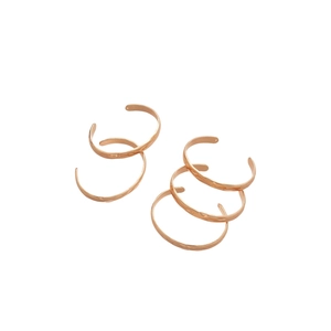Polished rose gold bangles with hammer texture and adjustable open design