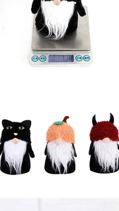 Three Halloween plush gnomes set showing weight of 17.9 grams on a digital scale