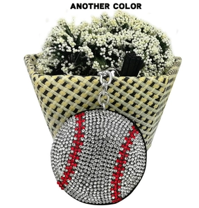 Macro detail of rhinestone baseball keychain featuring red stitching and silver link chain