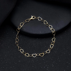 Elegant S925 sterling silver gold-plated bracelet featuring continuous hollow heart links