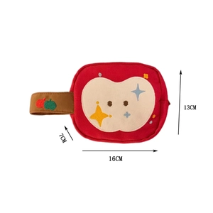 Detail showing red plush apple-shaped camera bag with embroidery and size measurements