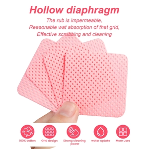 Macro shot of 100% cotton pink grid lint-free nail wipes with hollow diaphragm design