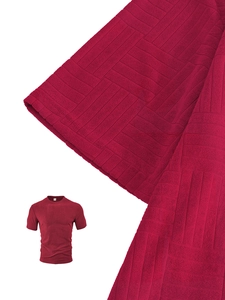Macro shot of dark red textured knit fabric on men's relaxed fit summer polo set