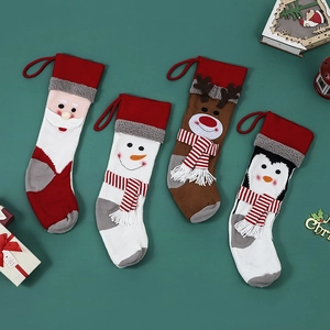 Knitted Christmas stockings set with Santa, Snowman, Reindeer and Penguin characters