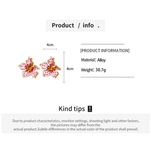 Detail view of pink floral earrings with red dots and size 4cm x 4cm measurement guide