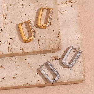 Rectangle earrings in gold and silver finish featuring micro-pave cubic zirconia accents