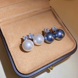 Elegant geometric pearl stud earrings with sparkling zircon inlay in a velvet box