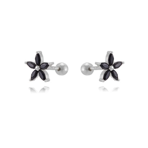 Macro shot of S925 silver stud earring with black marquise-cut stones in flower shape