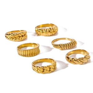 Set of 6 vintage gold plated stainless steel rings featuring diverse twisted textures