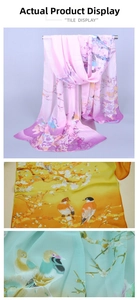 Detail view of semi-transparent chiffon scarves with floral and bird prints in three colors