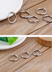 Detailed view of polished stainless steel jump rings for DIY jewelry making and crafts