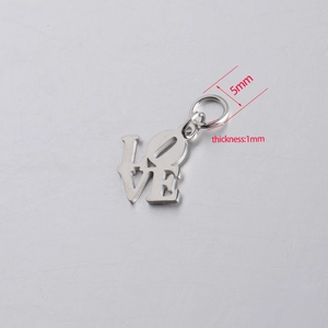 Detail view of silver stainless steel Love pendant with dimensions 16x19mm and 1mm thickness