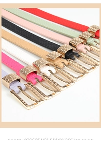 Close-up of colorful litchi pattern skinny leather belts with gold alloy pin buckles