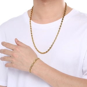 Close-up of 18k gold plated stainless steel coffee bean chain set on male model
