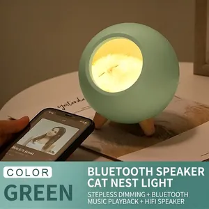 Cute pet house night light with green base, warm LED cat lamp and Bluetooth speaker feature