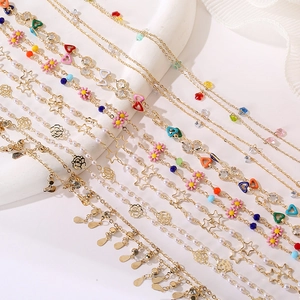 Fashionable layered necklaces with colorful enamel hearts and daisy floral pendants