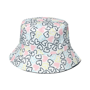 White sun bucket hat with colorful heart patterns and wide brim for summer outdoor wear