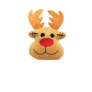 Cute plush reindeer Christmas brooch featuring brown fur and a red nose on white background