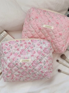 Quilted cotton makeup bag set with floral and rabbit prints for travel and storage