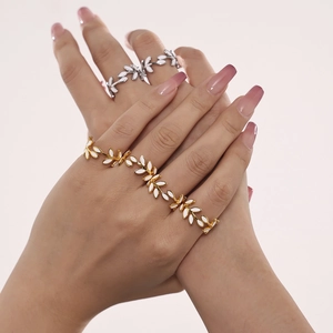 18k gold plated leaf bracelet and silver ring set with white enamel foliage design