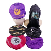 Detailed view of satin silk hair bonnets in various styles with printed logo designs